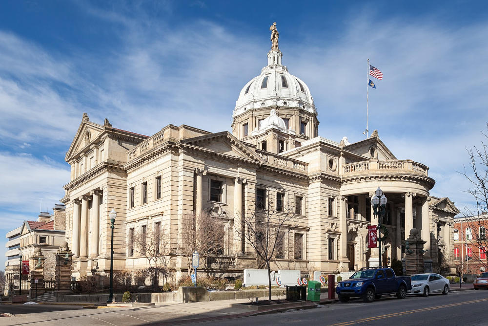 The Washington County Courthouse is constructed of sandstone and granite, capped with an 18-foot-tall statue of George Washington and is lavishly finished